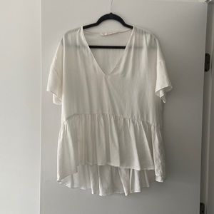 Zara Loose fitting peplum t-shirt